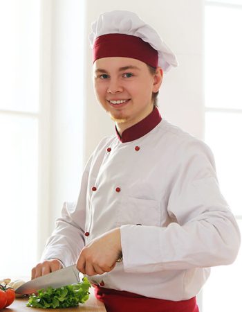 cheerful-chef-on-the-kitchen-2021-08-30-09-46-37-utc